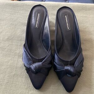 Navy blue satin slide evening shoe.